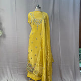 Regal Glow: Mustard Tissue Crepe Ensemble with Zardozi & Pearl Appliqué