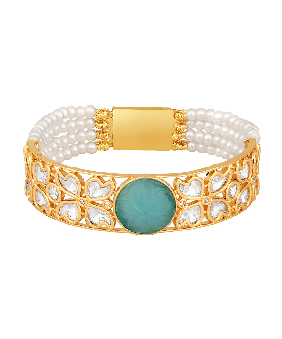 Designer gold brass polish with kundanpolki,shell pealrs and onyx carved stone