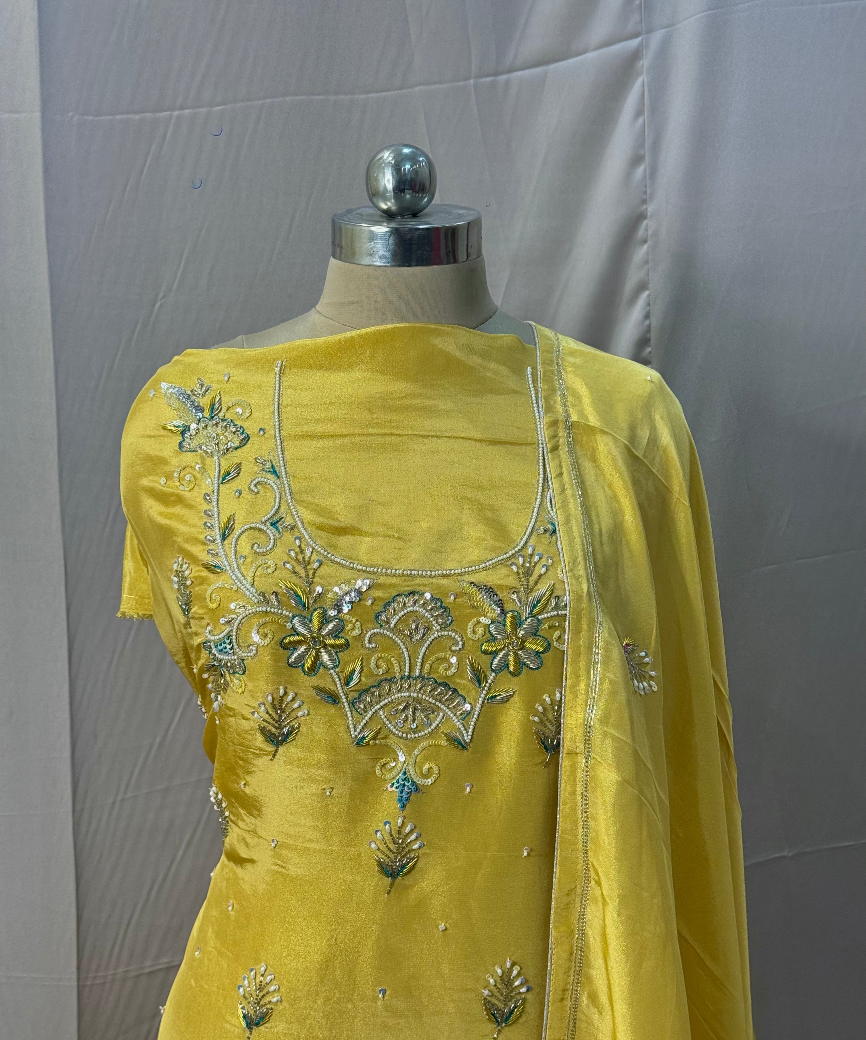 Regal Glow: Mustard Tissue Crepe Ensemble with Zardozi & Pearl Appliqué